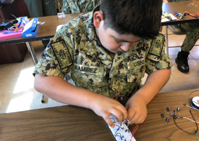 Sea Cadet learning with a basic electronics kit